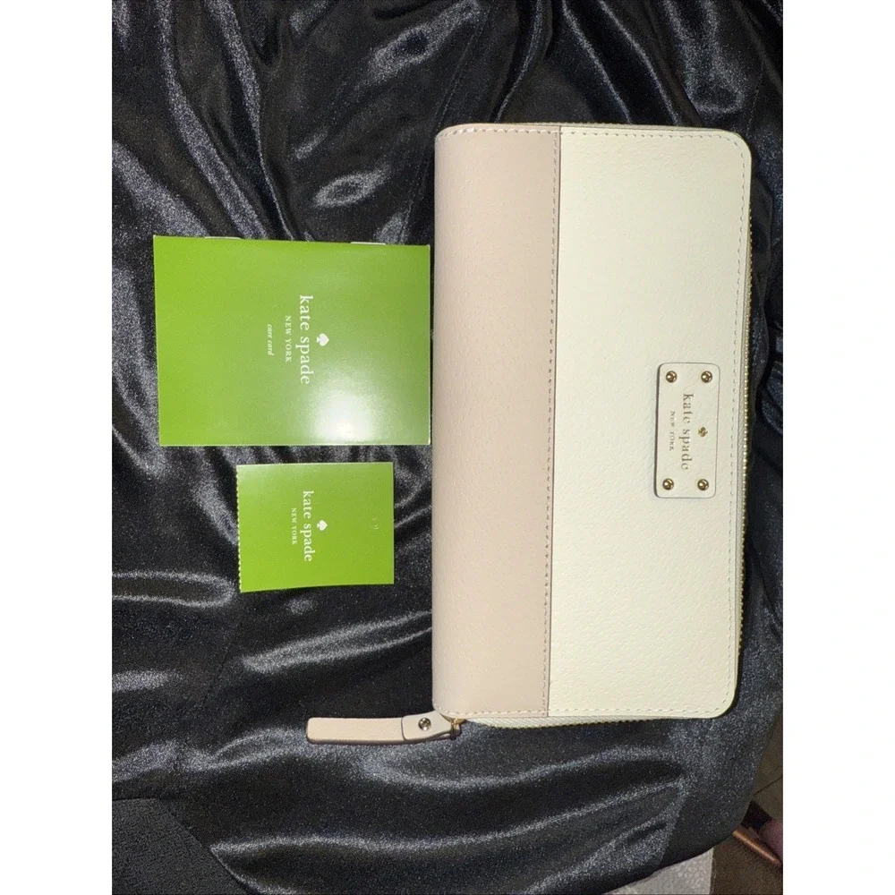 KATE SPADE large zip around white and tan wallet brand new